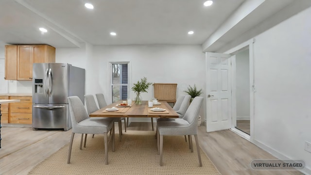 dining room featuring light wood-type flooring