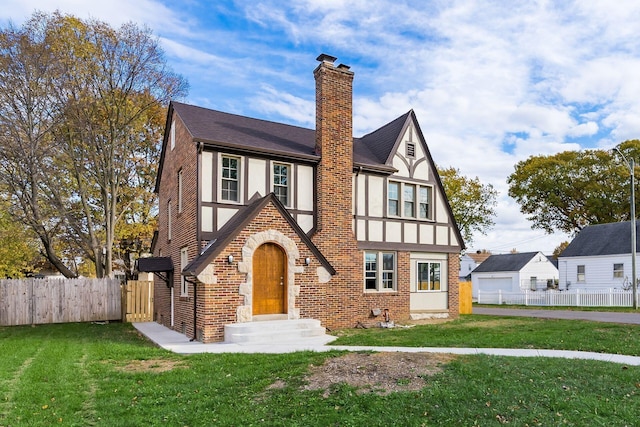 tudor house with a front lawn