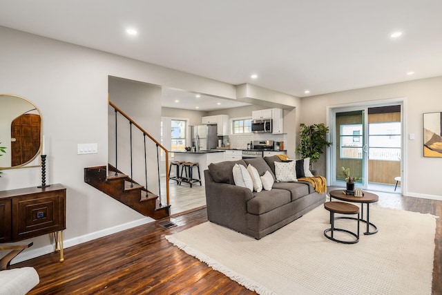 living room featuring dark hardwood / wood-style floors