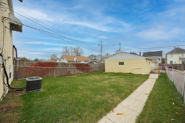 view of yard with central AC