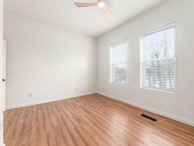 unfurnished room featuring ceiling fan and light hardwood / wood-style flooring