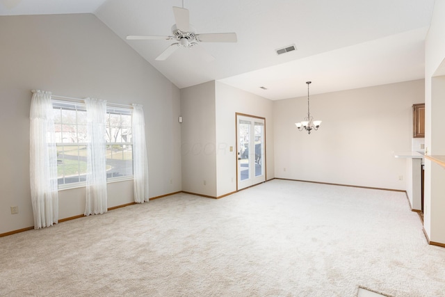 unfurnished living room featuring light carpet, high vaulted ceiling, and ceiling fan with notable chandelier