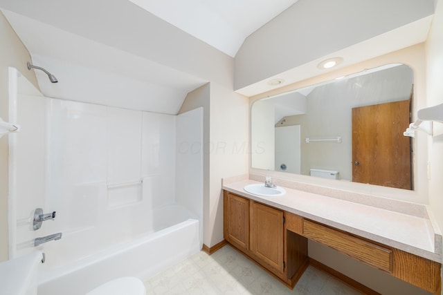 full bathroom featuring toilet, shower / bathing tub combination, vanity, and vaulted ceiling