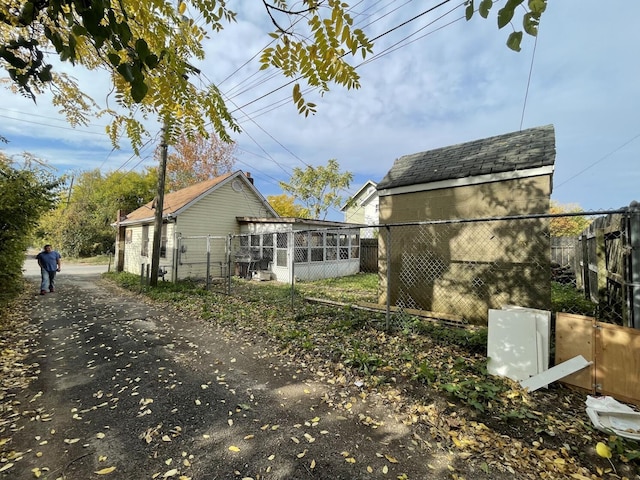 view of side of property with a sunroom