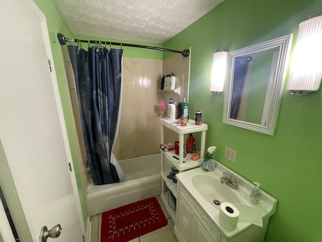 bathroom featuring vanity, a textured ceiling, and shower / tub combo