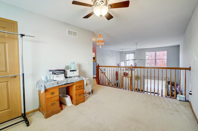 office area featuring light colored carpet and ceiling fan