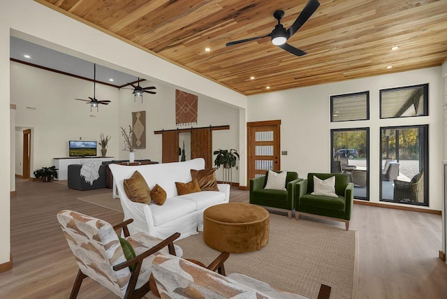 living room with a high ceiling, light wood-type flooring, and wooden ceiling