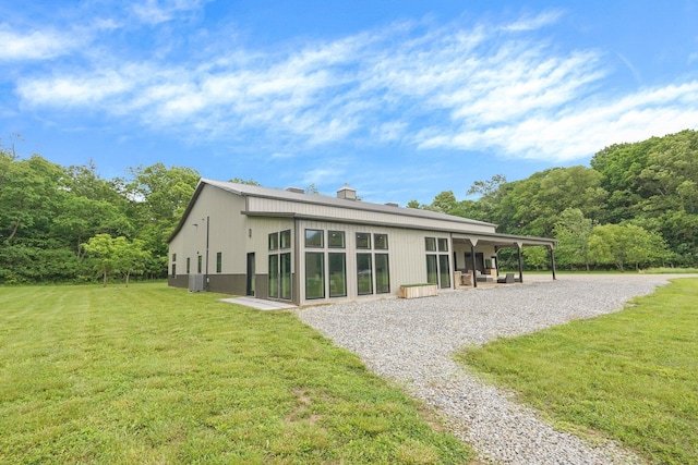 20020 Commercial Point Rd, Circleville, OH 43113 - back of house with a yard and a patio