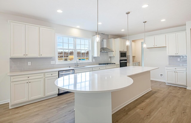 kitchen featuring white cabinetry, sink, and appliances with stainless steel finishes