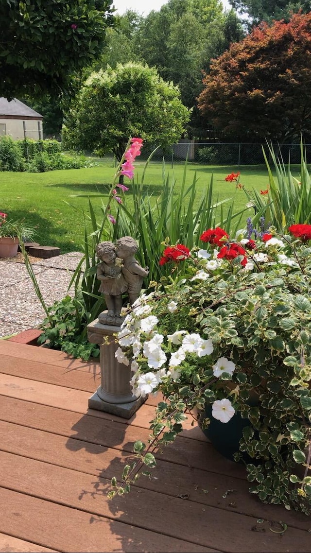 view of yard featuring a wooden deck