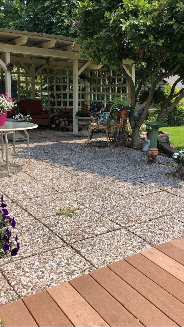 view of property's community with a gazebo and a patio area