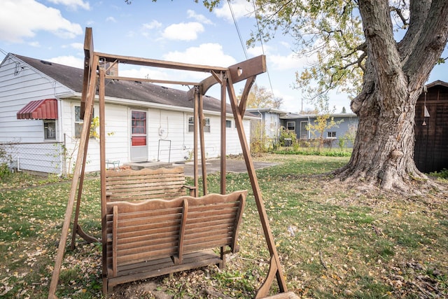 view of yard featuring a patio and fence