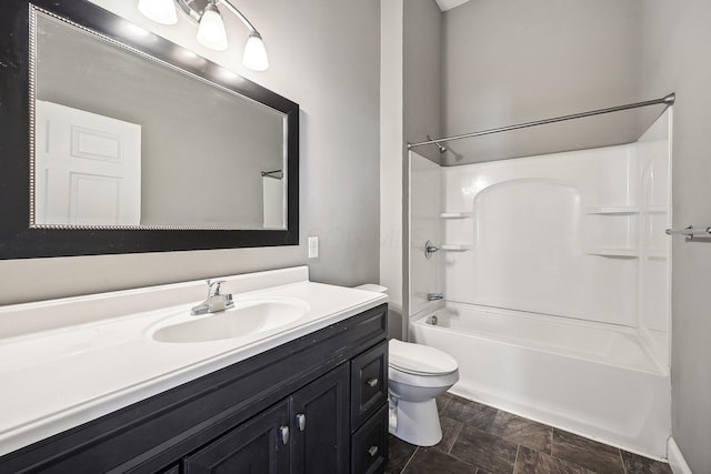 full bathroom featuring vanity, toilet, and shower / washtub combination