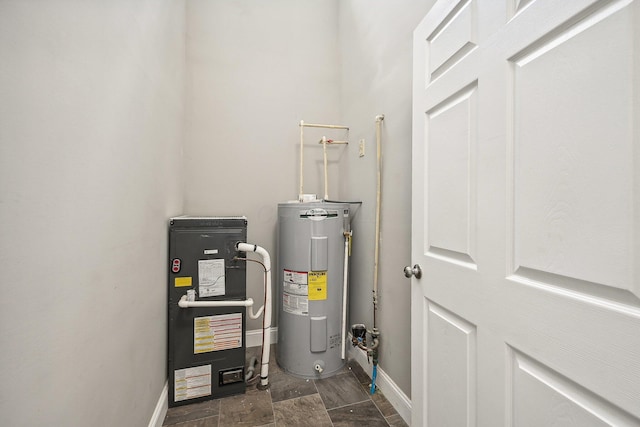 utility room featuring electric water heater