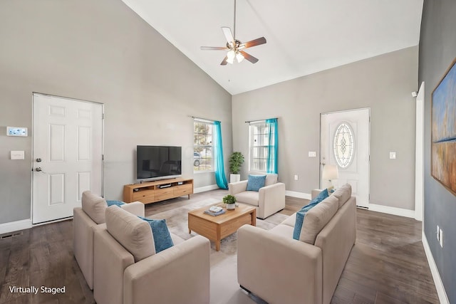 living room featuring hardwood / wood-style floors, high vaulted ceiling, and ceiling fan