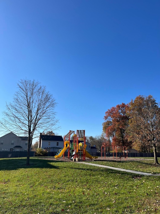 view of playground featuring a lawn