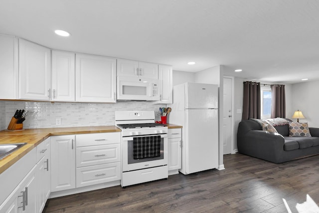 kitchen with white cabinetry, dark hardwood / wood-style floors, white appliances, and wood counters