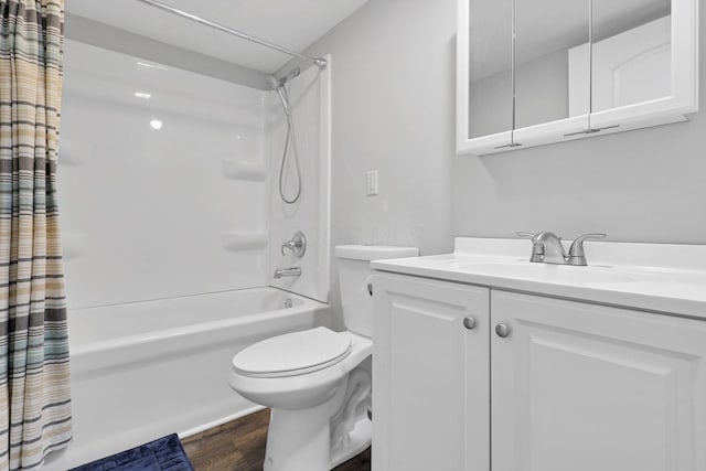 full bathroom featuring wood-type flooring, vanity, toilet, and shower / bath combo