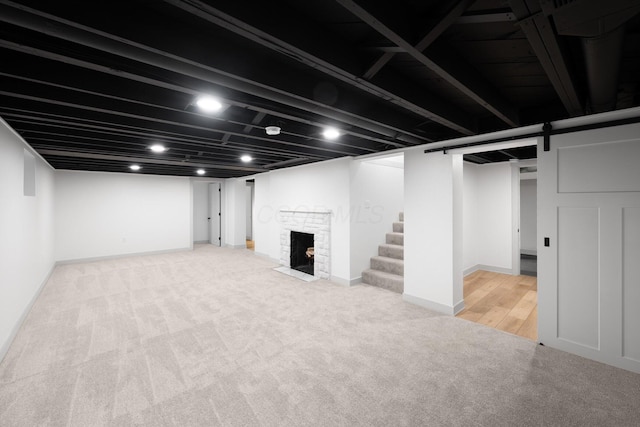 basement with light colored carpet