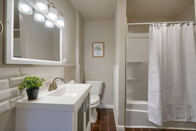 full bathroom featuring shower / bath combination with curtain, a textured ceiling, toilet, decorative backsplash, and vanity