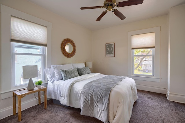 carpeted bedroom with ceiling fan