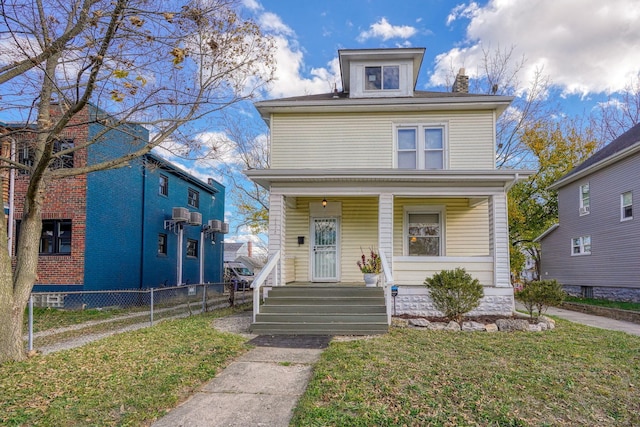 view of front of property with a front lawn