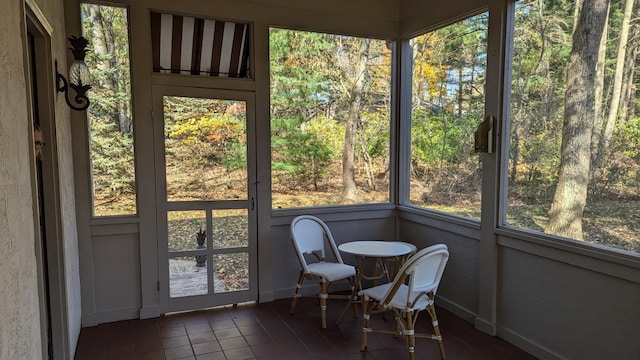 sunroom / solarium featuring plenty of natural light