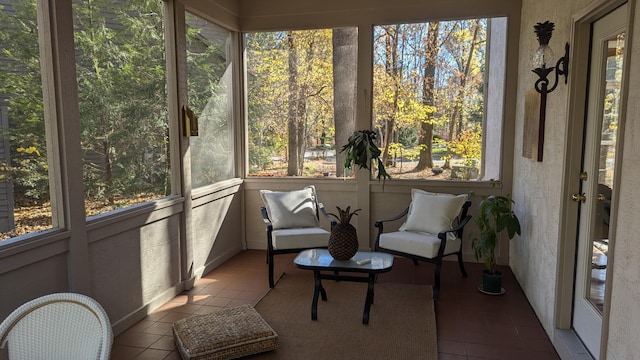 sunroom / solarium featuring a wealth of natural light