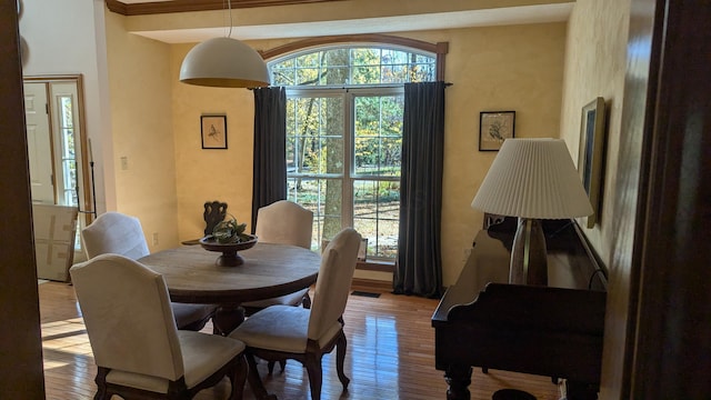 dining area with light wood-type flooring