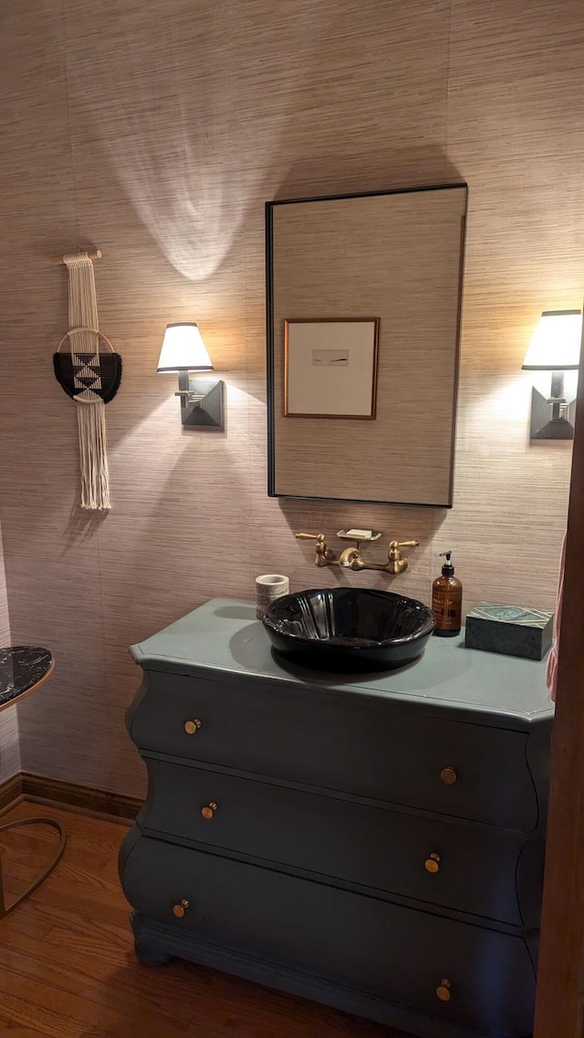 bathroom featuring hardwood / wood-style floors and vanity