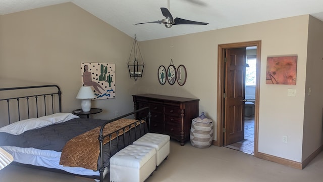 bedroom with ceiling fan, light colored carpet, and vaulted ceiling