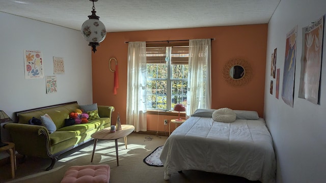 bedroom featuring carpet and multiple windows