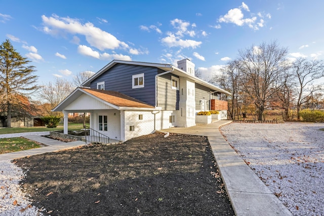 view of home's exterior featuring covered porch