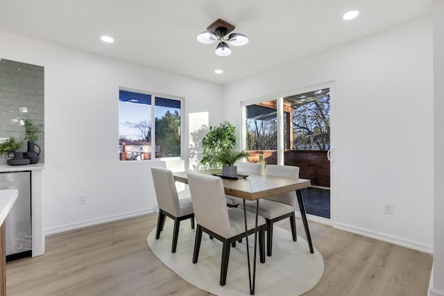 dining room featuring light wood-type flooring