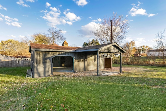 view of outdoor structure featuring a yard