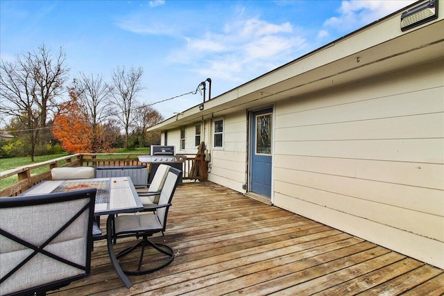 wooden terrace with grilling area