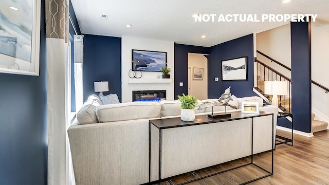 living room with hardwood / wood-style floors