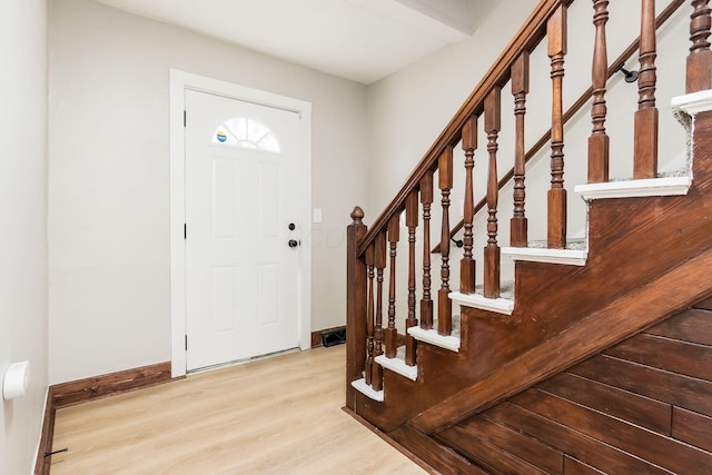 entrance foyer with light hardwood / wood-style flooring