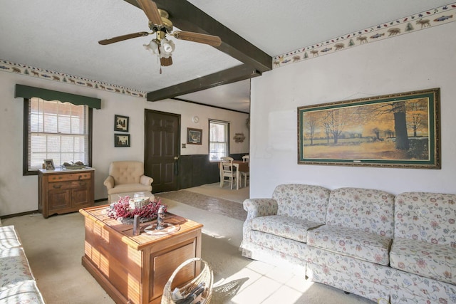 760 Henpeck Rd, Utica, OH 43080 - carpeted living room featuring beam ceiling and a ceiling fan