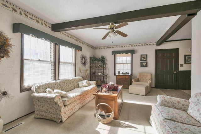 760 Henpeck Rd, Utica, OH 43080 - living area with carpet floors, beam ceiling, and a ceiling fan