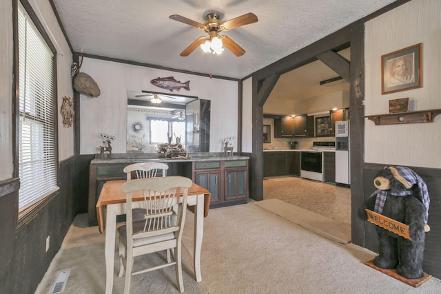 760 Henpeck Rd, Utica, OH 43080 - kitchen featuring white appliances, ceiling fan, a textured ceiling, and wooden walls
