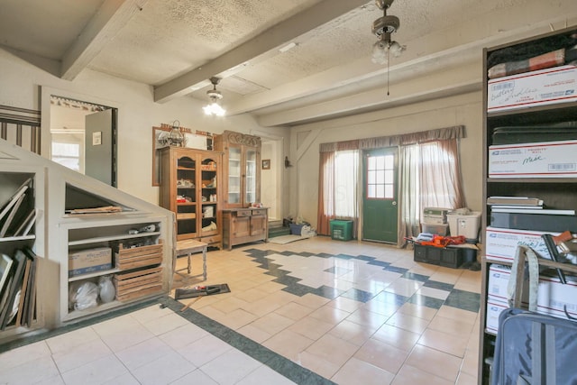 760 Henpeck Rd, Utica, OH 43080 - misc room with beam ceiling, tile patterned flooring, and a textured ceiling