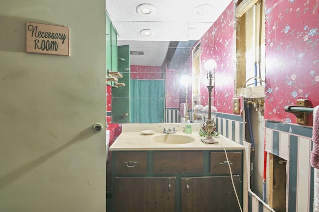 760 Henpeck Rd, Utica, OH 43080 - bathroom with vanity and wallpapered walls