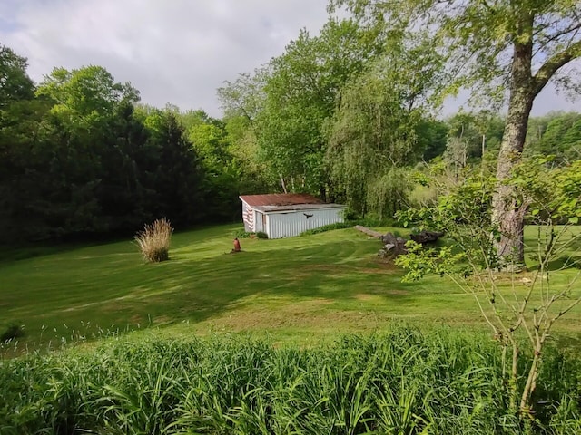 760 Henpeck Rd, Utica, OH 43080 - view of green lawn featuring an outbuilding