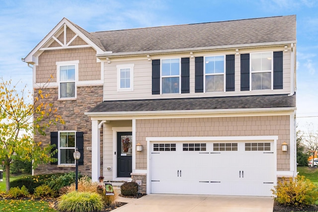 view of front of property with a garage