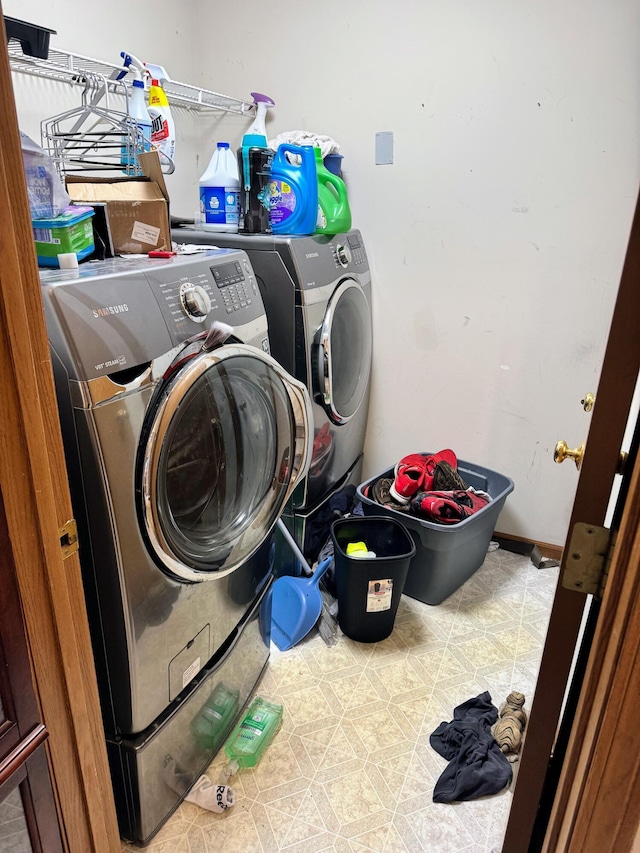 laundry area with washer and dryer