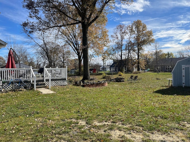 view of yard with a deck