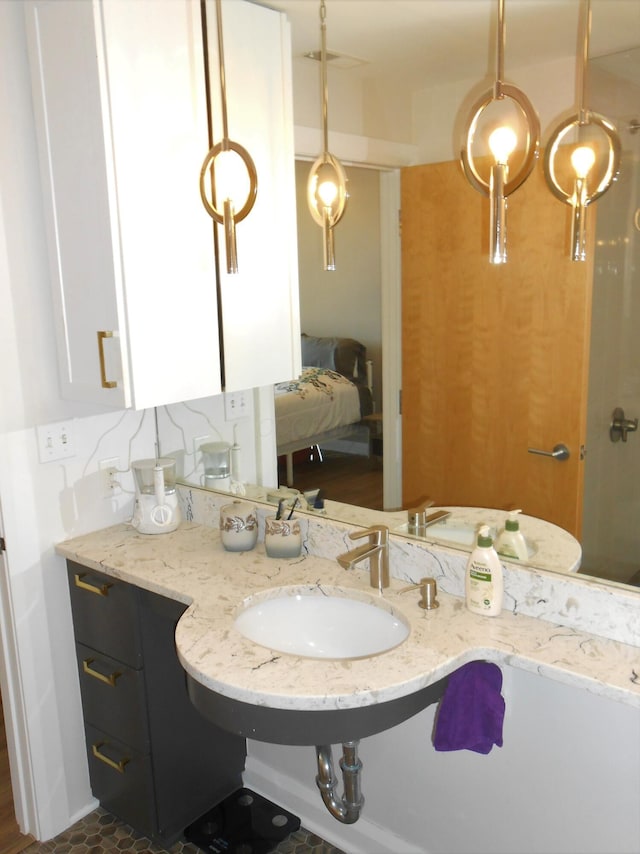 bathroom with backsplash and vanity