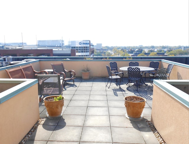 view of patio with a balcony