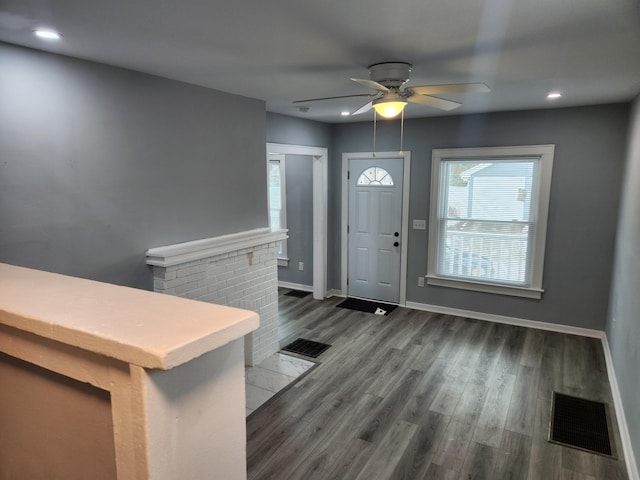 entryway with recessed lighting, wood finished floors, visible vents, and baseboards